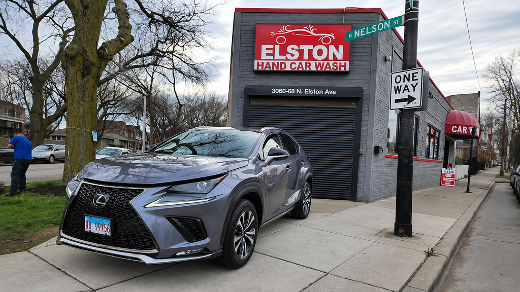 Elston Hand Car Wash in Chicago with a Lexus SUV parked outside.